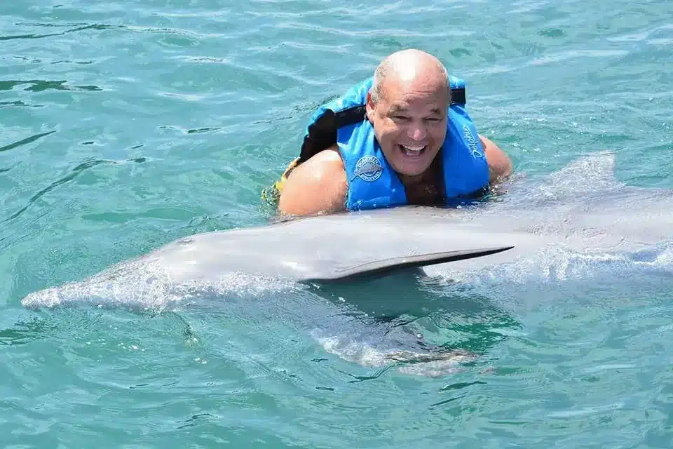 Ed's Biography v1 2 Ed swimming with dolphins